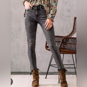 Grey distressed skinny jeans